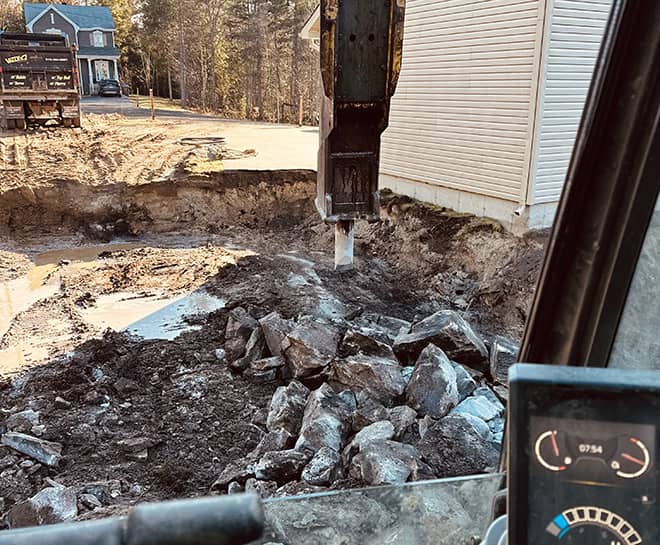 démolition béton fiable et professionnel par Vallex excavation